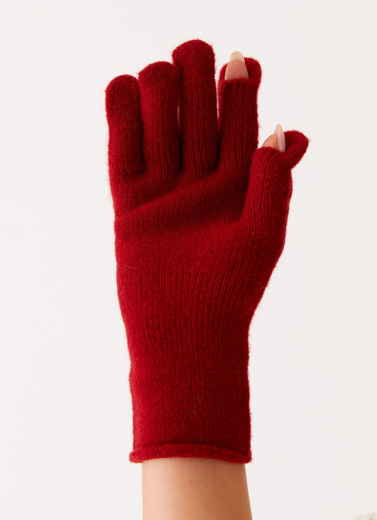 Womens Snow Angel Wool Gloves in the colour Red in front of a light grey background