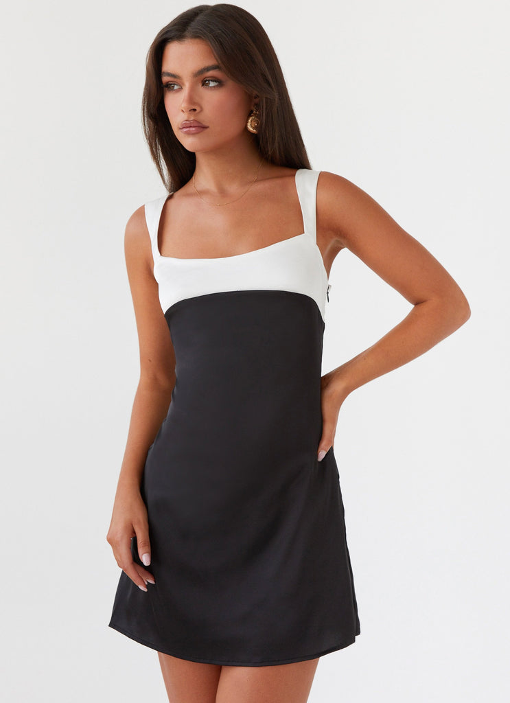 Womens Odette Satin Mini Dress in the colour Onyx in front of a light grey background