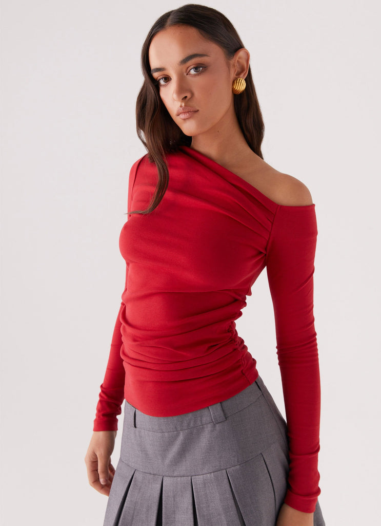 Womens Kiki Long Sleeve Top in the colour Cherry in front of a light grey background