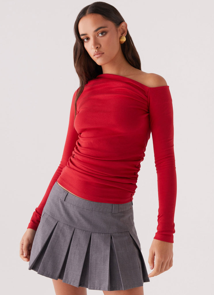 Womens Kiki Long Sleeve Top in the colour Cherry in front of a light grey background