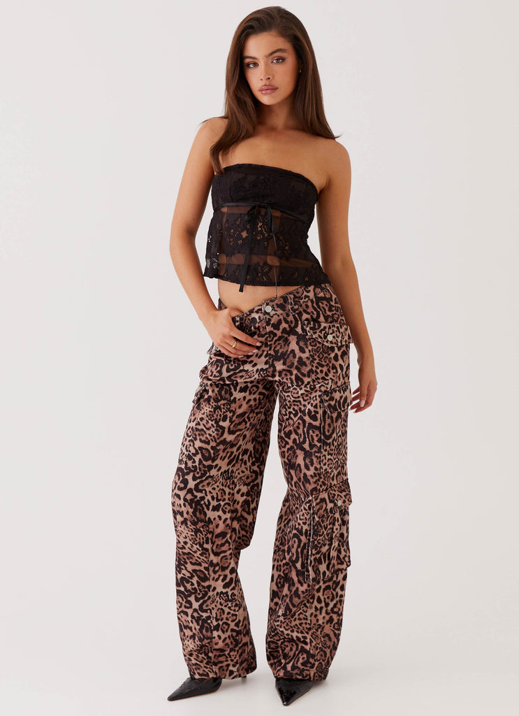 Womens Greedy Cargo Pants in the colour Leopard in front of a light grey background