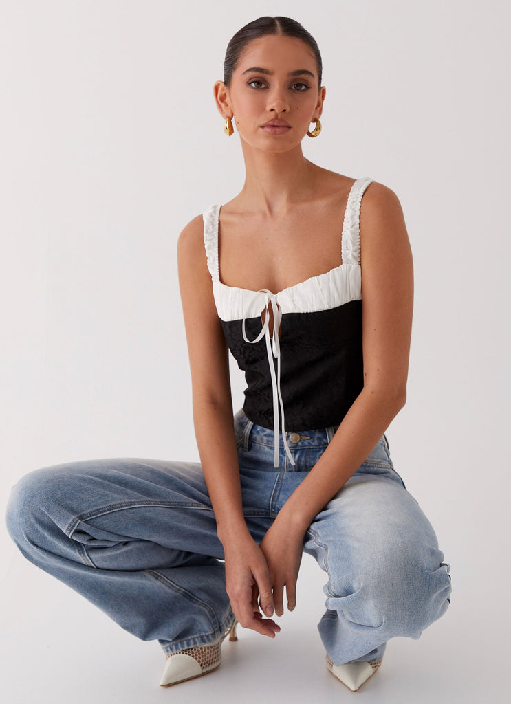 Womens Ryder Bustier Top in the colour Black in front of a light grey background