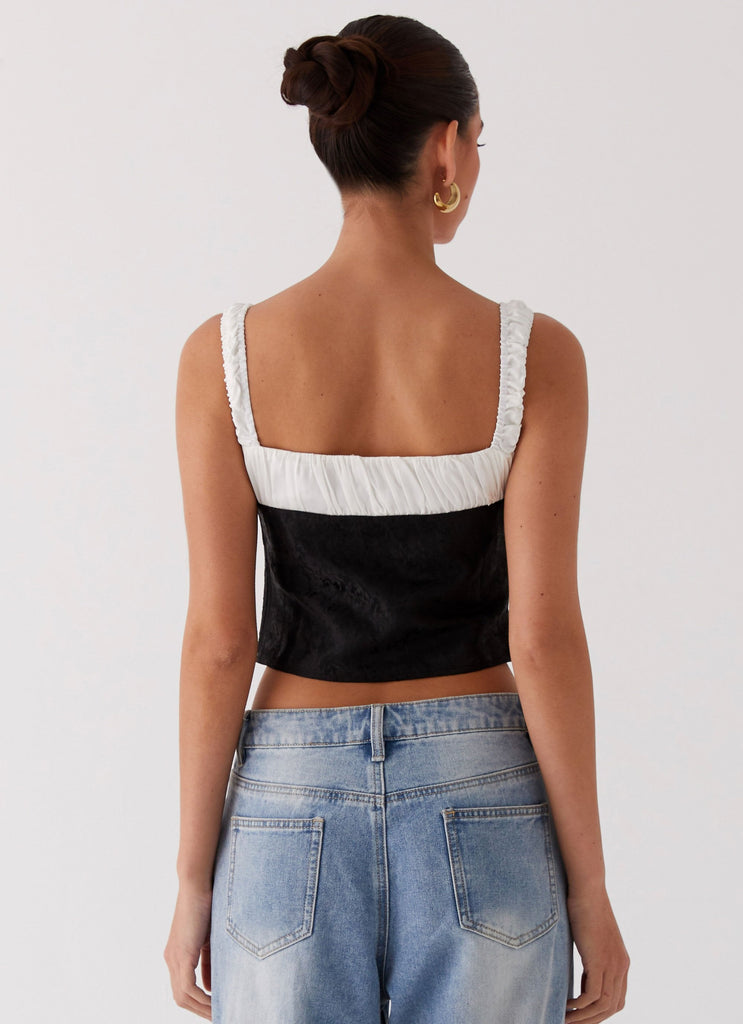 Womens Ryder Bustier Top in the colour Black in front of a light grey background