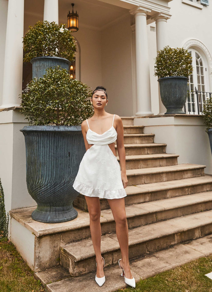 Womens Dorothea Mini Dress in the colour White in front of a light grey background