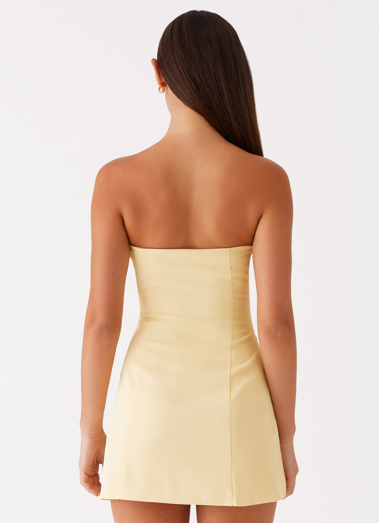 Womens Ayanna Strapless Mini Dress in the colour Yellow in front of a light grey background