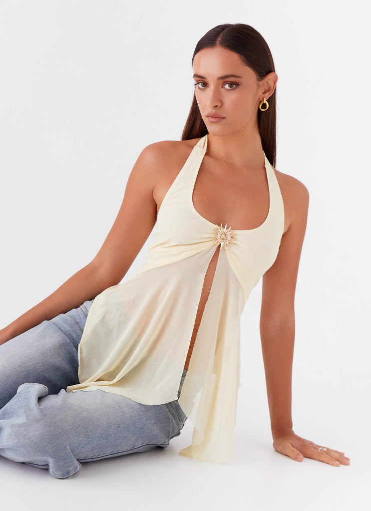 Womens Sunbeam Mesh Top in the colour Yellow in front of a light grey background