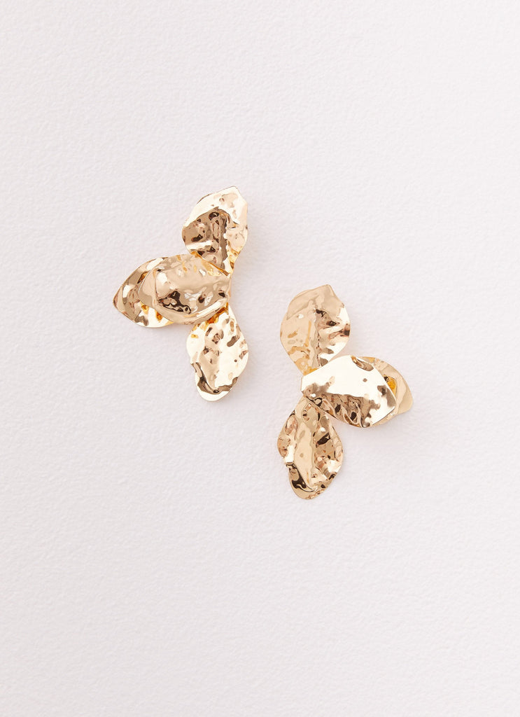 Womens Stonelet Statement Earrings in the colour Gold in front of a light grey background