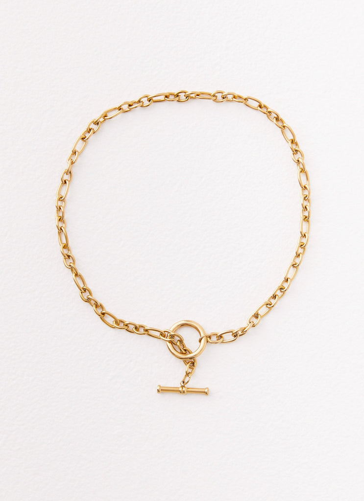 Womens Tally Chain Tin the colourBar Necklace in the colour Gold in front of a light grey background