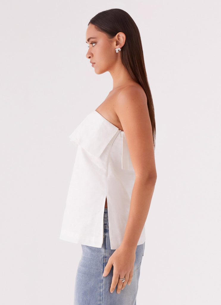 Womens Dalmia Linen Top in the colour White in front of a light grey background