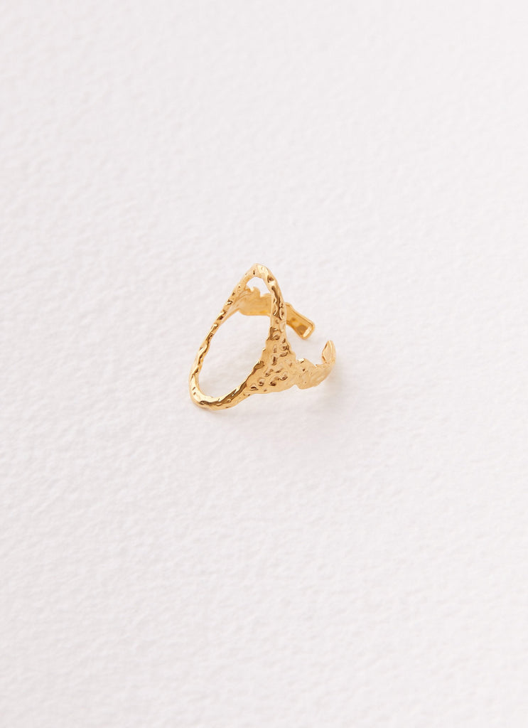 Womens Kyra Oval Textured Ring in the colour Gold in front of a light grey background