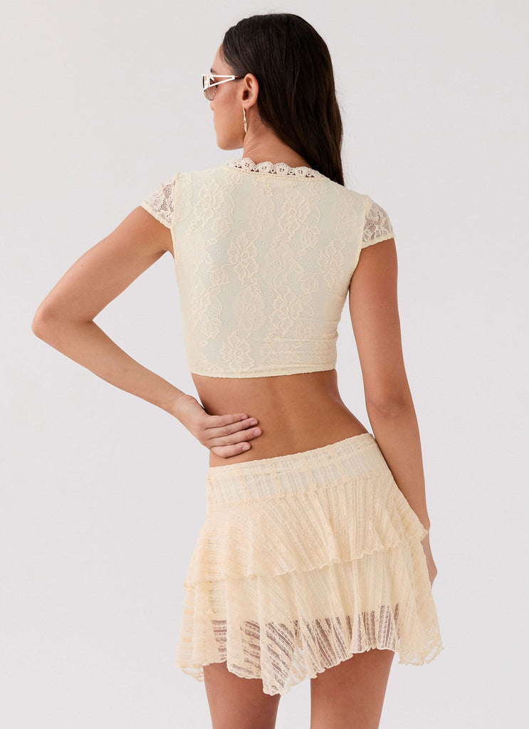 Womens Coconut Cove Mini Skirt in the colour Ivory in front of a light grey background