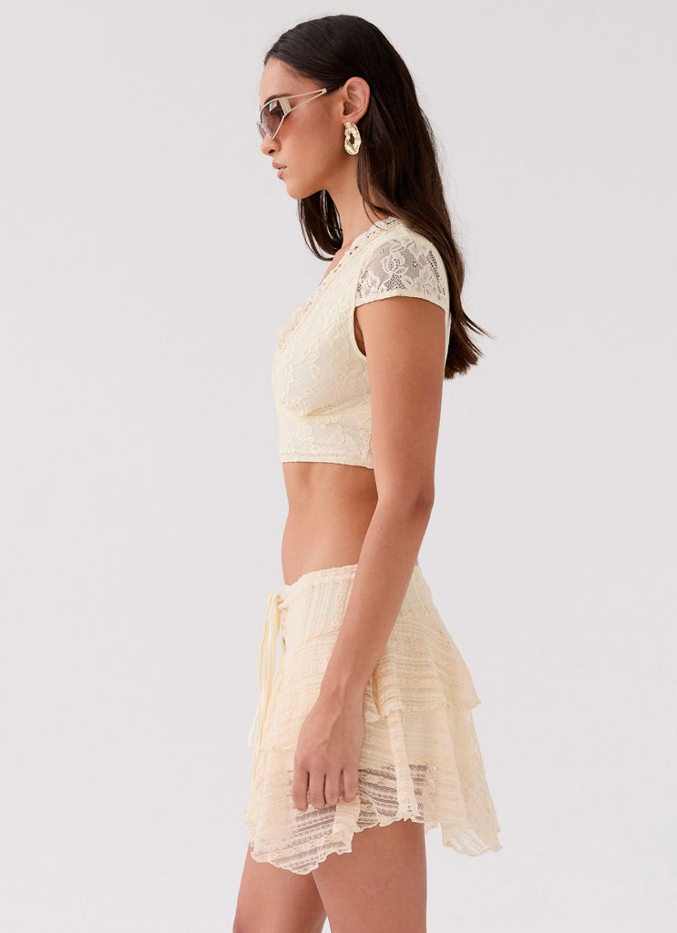 Womens Coconut Cove Mini Skirt in the colour Ivory in front of a light grey background