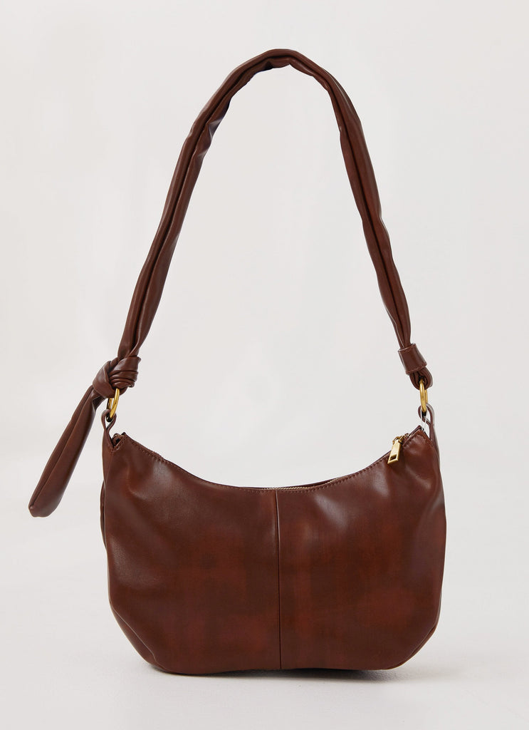 Womens Tana Shoulder Bag in the colour Brown in front of a light grey background