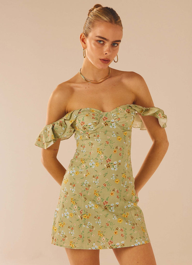 Womens The Chateau Mini Dress in the colour Sage Floral in front of a light grey background