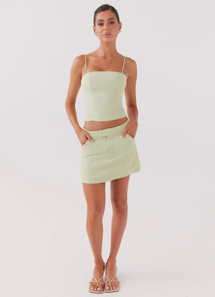 Womens Eliana Suit Mini Skirt in the colour Green Zest in front of a light grey background