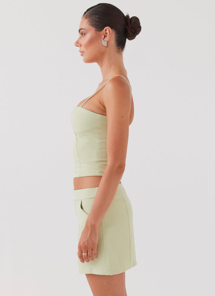 Womens Eliana Suit Mini Skirt in the colour Green Zest in front of a light grey background