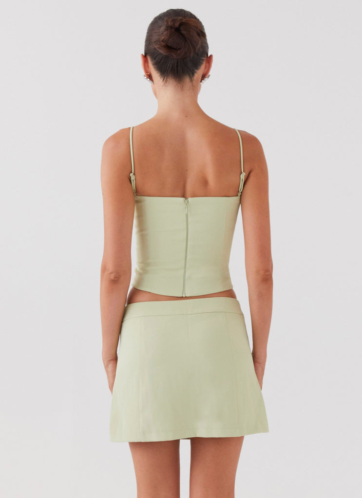 Womens Eliana Suit Mini Skirt in the colour Green Zest in front of a light grey background