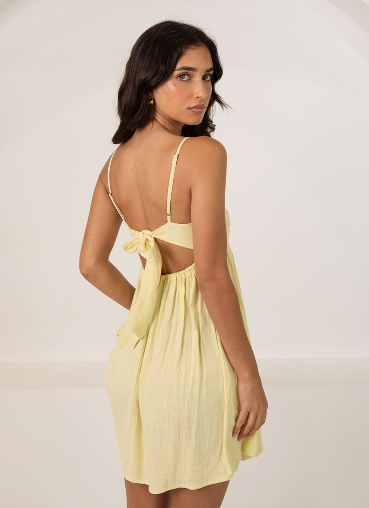 Womens Admire You Linen Mini Dress in the colour Lemon in front of a light grey background