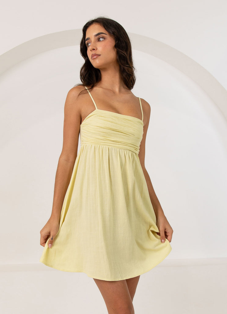 Womens Admire You Linen Mini Dress in the colour Lemon in front of a light grey background