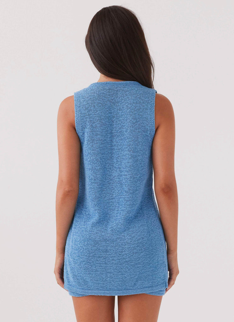 Womens Capri Glow Knit Top in the colour Azure in front of a light grey background