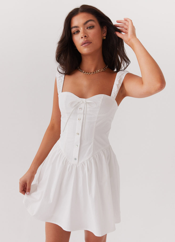 Womens Rebel Heart Corset Dress in the colour White in front of a light grey background