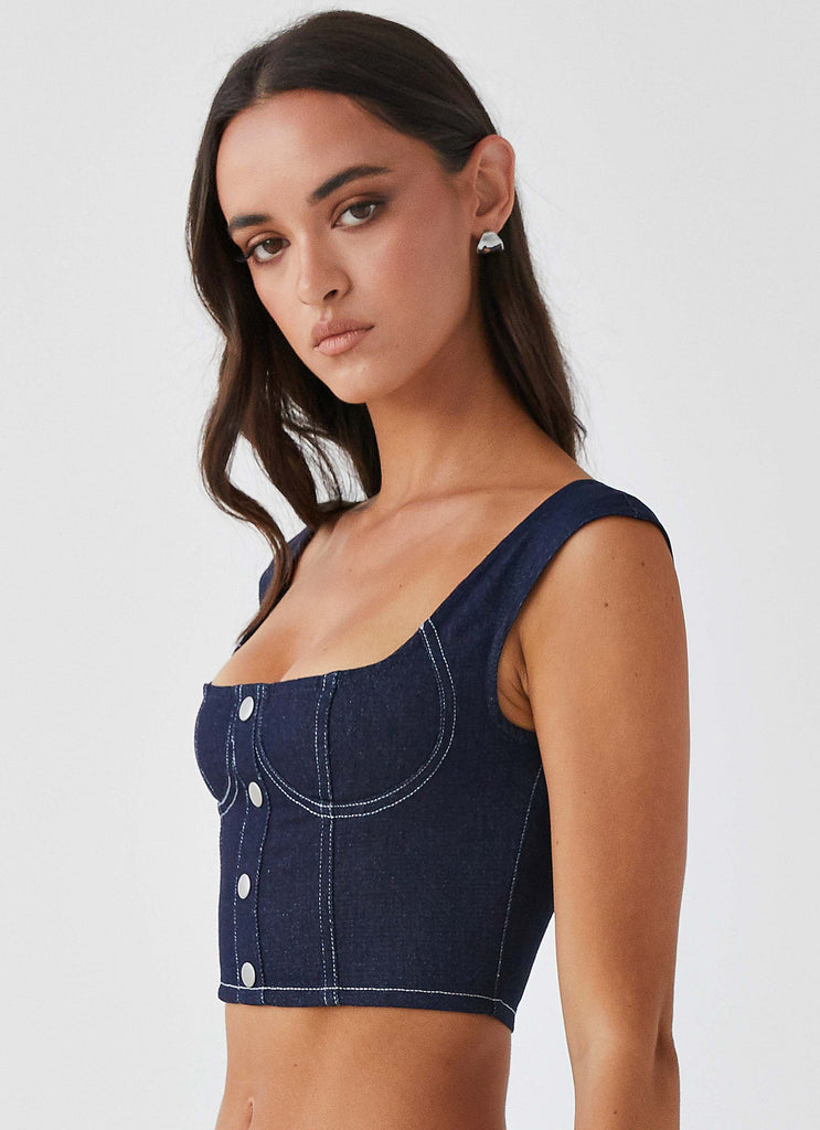 Womens Isabella Denim Bustier Top in the colour Indigo in front of a light grey background