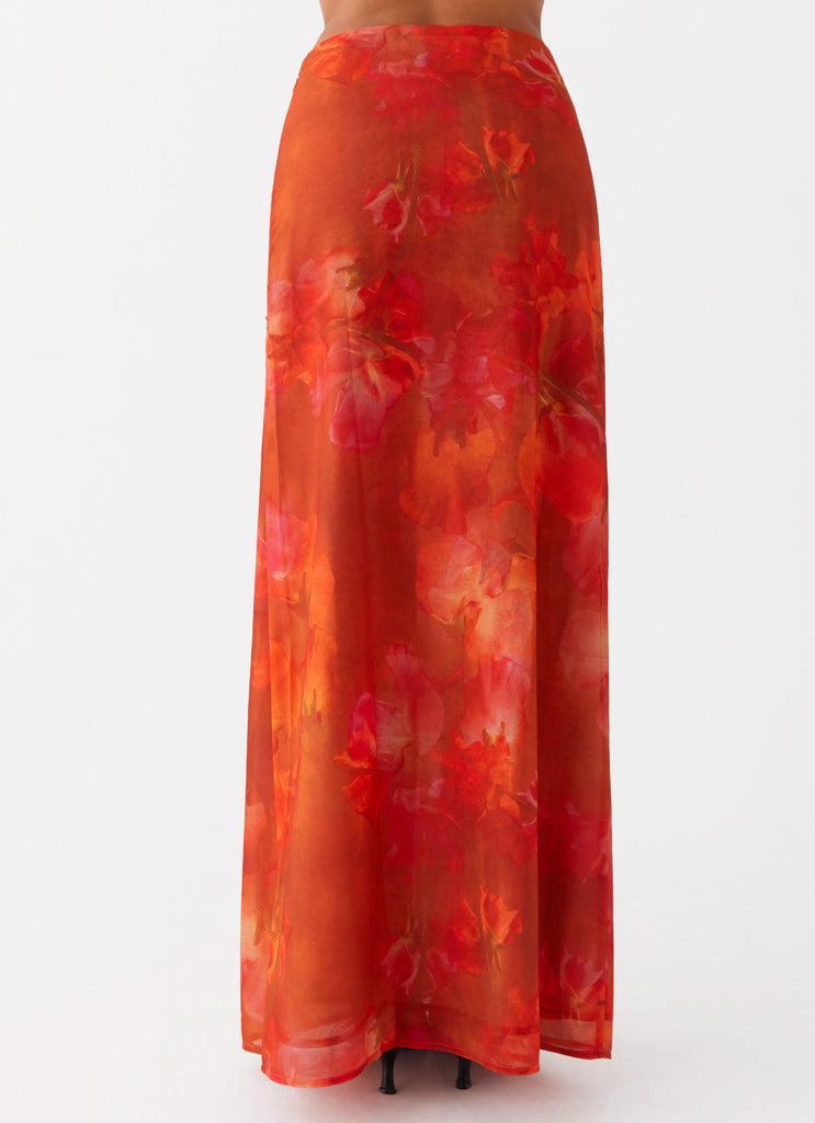 Womens Roame Maxi Skirt in the colour Amber in front of a light grey background