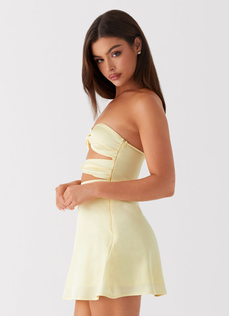 Womens Tianna Mini Dress in the colour Yellow in front of a light grey background