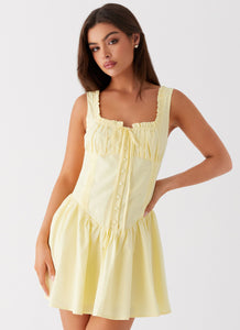 Womens Wren Mini Dress in the colour Yellow in front of a light grey background